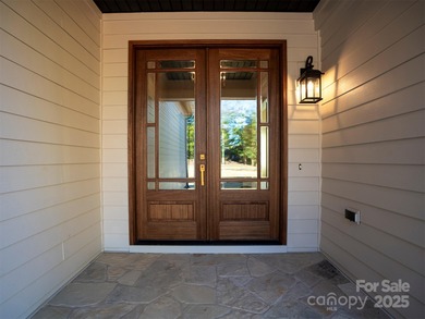 Experience refined living in this stunning new construction on River Oaks Country Club in North Carolina - for sale on GolfHomes.com, golf home, golf lot