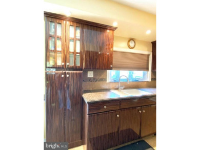 Nestled under mature shade trees in Willingboro's Country Club on Rancocas Golf Club in New Jersey - for sale on GolfHomes.com, golf home, golf lot