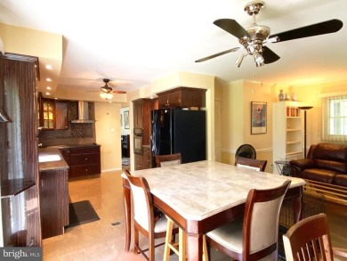 Nestled under mature shade trees in Willingboro's Country Club on Rancocas Golf Club in New Jersey - for sale on GolfHomes.com, golf home, golf lot