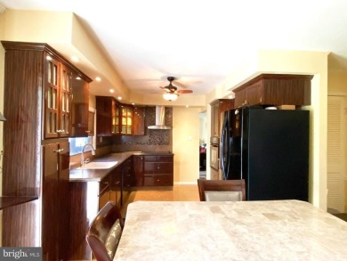 Nestled under mature shade trees in Willingboro's Country Club on Rancocas Golf Club in New Jersey - for sale on GolfHomes.com, golf home, golf lot