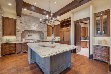 Welcome to this stunning 4-bedroom, 5.5-bathroom retreat nestled on The Traditions Club At Texas A and M in Texas - for sale on GolfHomes.com, golf home, golf lot