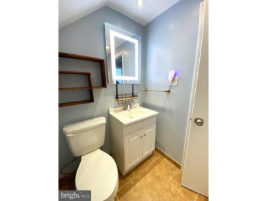 Nestled under mature shade trees in Willingboro's Country Club on Rancocas Golf Club in New Jersey - for sale on GolfHomes.com, golf home, golf lot