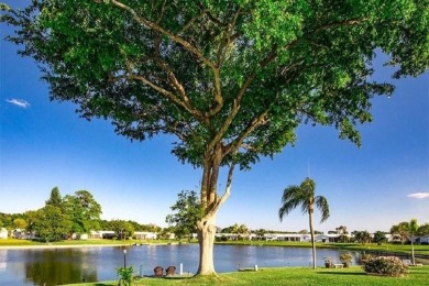 Lovely Corner Leisureville Home (55+) located just east of on Leisureville Community Golf Course in Florida - for sale on GolfHomes.com, golf home, golf lot