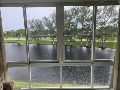 Don't miss this opportunity! Impeccably maintained 1 bedroom, 1 on Hillsboro Pines Golf in Florida - for sale on GolfHomes.com, golf home, golf lot