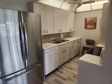 Don't miss this opportunity! Impeccably maintained 1 bedroom, 1 on Hillsboro Pines Golf in Florida - for sale on GolfHomes.com, golf home, golf lot