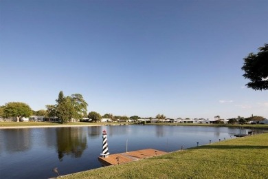 Lovely Corner Leisureville Home (55+) located just east of on Leisureville Community Golf Course in Florida - for sale on GolfHomes.com, golf home, golf lot