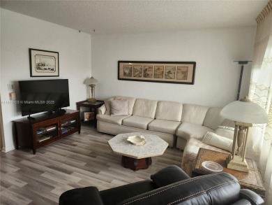 Don't miss this opportunity! Impeccably maintained 1 bedroom, 1 on Hillsboro Pines Golf in Florida - for sale on GolfHomes.com, golf home, golf lot