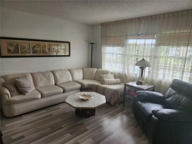 Don't miss this opportunity! Impeccably maintained 1 bedroom, 1 on Hillsboro Pines Golf in Florida - for sale on GolfHomes.com, golf home, golf lot