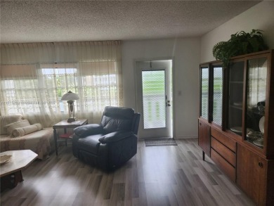Don't miss this opportunity! Impeccably maintained 1 bedroom, 1 on Hillsboro Pines Golf in Florida - for sale on GolfHomes.com, golf home, golf lot