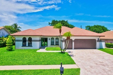 10099 Canoe Brook Circle on Boca Greens Country Club in Florida - for sale on GolfHomes.com, golf home, golf lot