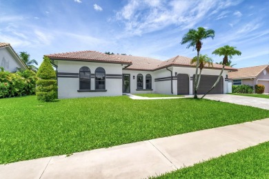 10099 Canoe Brook Circle on Boca Greens Country Club in Florida - for sale on GolfHomes.com, golf home, golf lot