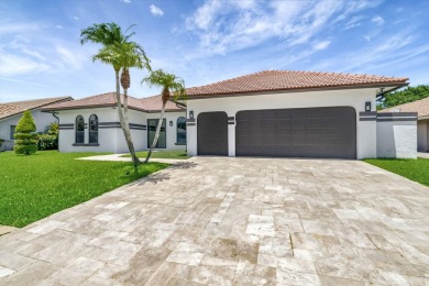 10099 Canoe Brook Circle on Boca Greens Country Club in Florida - for sale on GolfHomes.com, golf home, golf lot