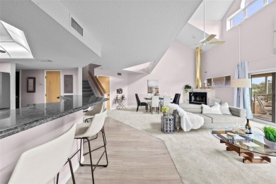 Experience maintenance-free living in this spacious 3-story on Pasadena Yacht and Country Club in Florida - for sale on GolfHomes.com, golf home, golf lot