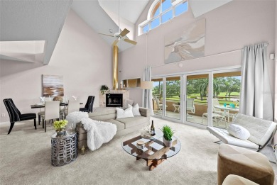 Experience maintenance-free living in this spacious 3-story on Pasadena Yacht and Country Club in Florida - for sale on GolfHomes.com, golf home, golf lot