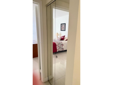 Experience luxury living in this stunning 2-bedroom, 2-bath on Turnberry Isle Resort and Club in Florida - for sale on GolfHomes.com, golf home, golf lot