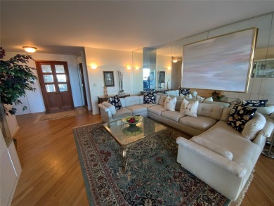 Huge living room with formal dining room. White gourmet eat in on Towers Country Club in New York - for sale on GolfHomes.com, golf home, golf lot