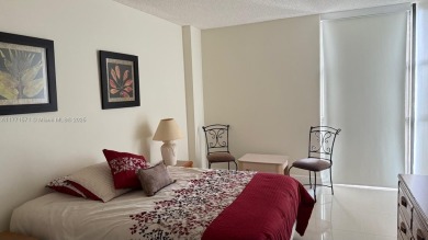 Experience luxury living in this stunning 2-bedroom, 2-bath on Turnberry Isle Resort and Club in Florida - for sale on GolfHomes.com, golf home, golf lot