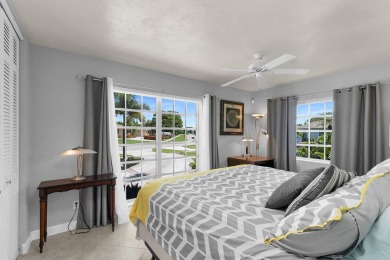 IT IS ALL ABOUT THE LOCATION. This home sits on a lake looking on Island Country Club in Florida - for sale on GolfHomes.com, golf home, golf lot
