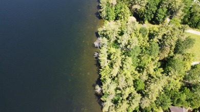 Looking for an exceptional location to build your lakefront on Belgrade Lakes Golf Club in Maine - for sale on GolfHomes.com, golf home, golf lot