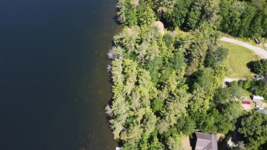 Looking for an exceptional location to build your lakefront on Belgrade Lakes Golf Club in Maine - for sale on GolfHomes.com, golf home, golf lot