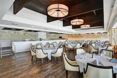 Experience luxury living in this stunning 2-bedroom, 2-bath on Turnberry Isle Resort and Club in Florida - for sale on GolfHomes.com, golf home, golf lot
