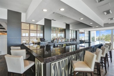 Experience luxury living in this stunning 2-bedroom, 2-bath on Turnberry Isle Resort and Club in Florida - for sale on GolfHomes.com, golf home, golf lot