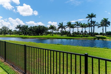 IT IS ALL ABOUT THE LOCATION. This home sits on a lake looking on Island Country Club in Florida - for sale on GolfHomes.com, golf home, golf lot