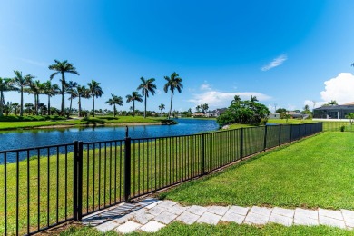 IT IS ALL ABOUT THE LOCATION. This home sits on a lake looking on Island Country Club in Florida - for sale on GolfHomes.com, golf home, golf lot