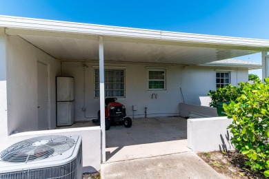 IT IS ALL ABOUT THE LOCATION. This home sits on a lake looking on Island Country Club in Florida - for sale on GolfHomes.com, golf home, golf lot