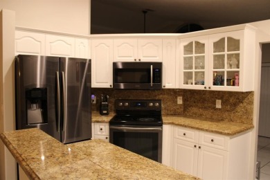 Spacious 4BR/2.5BA single-family home with 2-car garage in on The Carolina Club in Florida - for sale on GolfHomes.com, golf home, golf lot