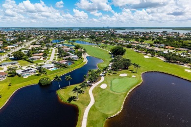 IT IS ALL ABOUT THE LOCATION. This home sits on a lake looking on Island Country Club in Florida - for sale on GolfHomes.com, golf home, golf lot