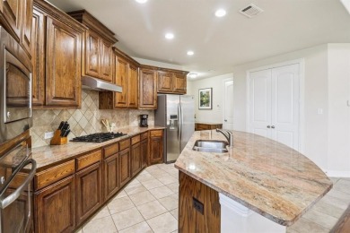 Step into elegance and comfort in this stunning home located in on The Tribute At the Colony in Texas - for sale on GolfHomes.com, golf home, golf lot