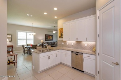 This end-unit townhome located in the highly sought after on Plantation Bay Golf and Country Club in Florida - for sale on GolfHomes.com, golf home, golf lot