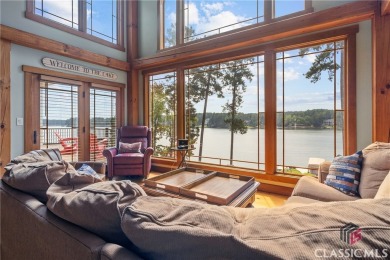 Discover luxurious lakefront living with this stunning custom on Reynolds Lake Oconee - The Oconee in Georgia - for sale on GolfHomes.com, golf home, golf lot