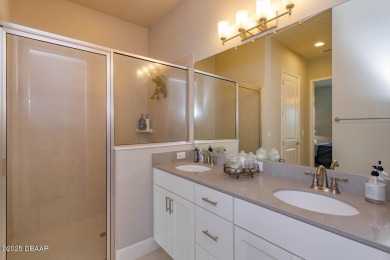 This end-unit townhome located in the highly sought after on Plantation Bay Golf and Country Club in Florida - for sale on GolfHomes.com, golf home, golf lot