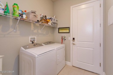 This end-unit townhome located in the highly sought after on Plantation Bay Golf and Country Club in Florida - for sale on GolfHomes.com, golf home, golf lot