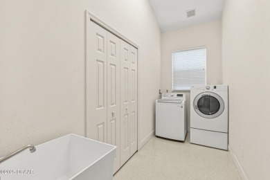 Welcome to this stunning 3-bedroom, 2-bathroom home located in a on Grand Haven Golf Club in Florida - for sale on GolfHomes.com, golf home, golf lot