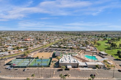 Beautifully remodeled Sun City gem with RARE oversized epoxied 2 on Sun City Riverview Golf Course in Arizona - for sale on GolfHomes.com, golf home, golf lot