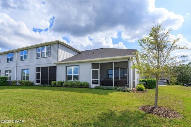 This end-unit townhome located in the highly sought after on Plantation Bay Golf and Country Club in Florida - for sale on GolfHomes.com, golf home, golf lot