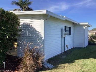 Pride of ownership throughout this well maintained
home in on Riviera Golf Club in Florida - for sale on GolfHomes.com, golf home, golf lot