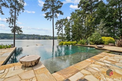 Discover luxurious lakefront living with this stunning custom on Reynolds Lake Oconee - The Oconee in Georgia - for sale on GolfHomes.com, golf home, golf lot