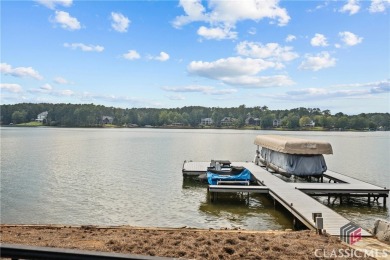 Discover luxurious lakefront living with this stunning custom on Reynolds Lake Oconee - The Oconee in Georgia - for sale on GolfHomes.com, golf home, golf lot