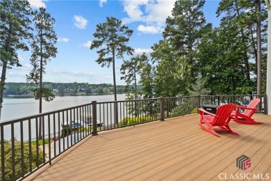 Discover luxurious lakefront living with this stunning custom on Reynolds Lake Oconee - The Oconee in Georgia - for sale on GolfHomes.com, golf home, golf lot