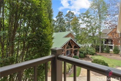 Discover luxurious lakefront living with this stunning custom on Reynolds Lake Oconee - The Oconee in Georgia - for sale on GolfHomes.com, golf home, golf lot