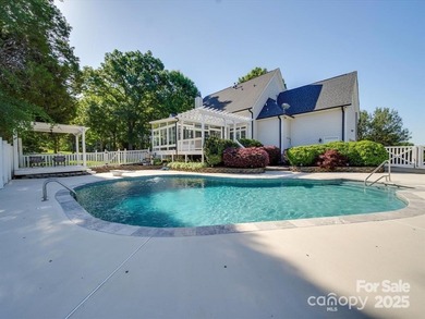 Perched atop a picturesque cul-de-sac lot, this beautifully on Cabarrus Country Club in North Carolina - for sale on GolfHomes.com, golf home, golf lot