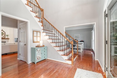 Perched atop a picturesque cul-de-sac lot, this beautifully on Cabarrus Country Club in North Carolina - for sale on GolfHomes.com, golf home, golf lot