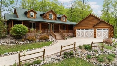 Stunning, custom-built log home overlooking the 16th tee & on Cedar River Golf Course in Michigan - for sale on GolfHomes.com, golf home, golf lot