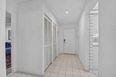 Elegant Country Club Living - Spacious 2-Bedroom + Den with Lake on Hunters Run Golf and Country Club in Florida - for sale on GolfHomes.com, golf home, golf lot