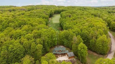 Stunning, custom-built log home overlooking the 16th tee & on Cedar River Golf Course in Michigan - for sale on GolfHomes.com, golf home, golf lot