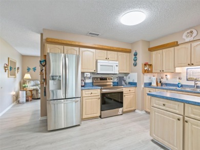 Welcome to this charming 2 bedroom, 2 bath ranch home located in on The Links of Spruce Creek in Florida - for sale on GolfHomes.com, golf home, golf lot